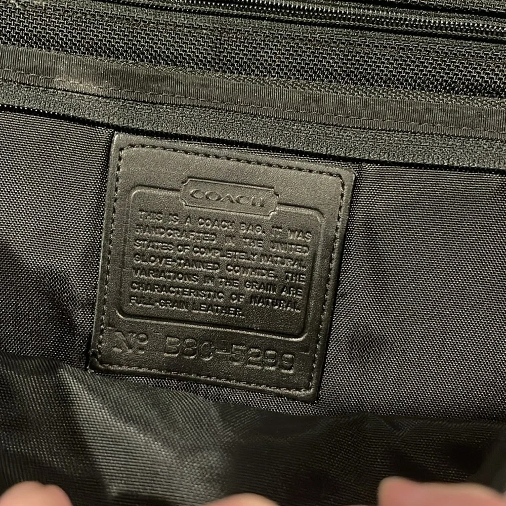 Coach vintage Men's Black Leather laptop Bag, some sign of used.